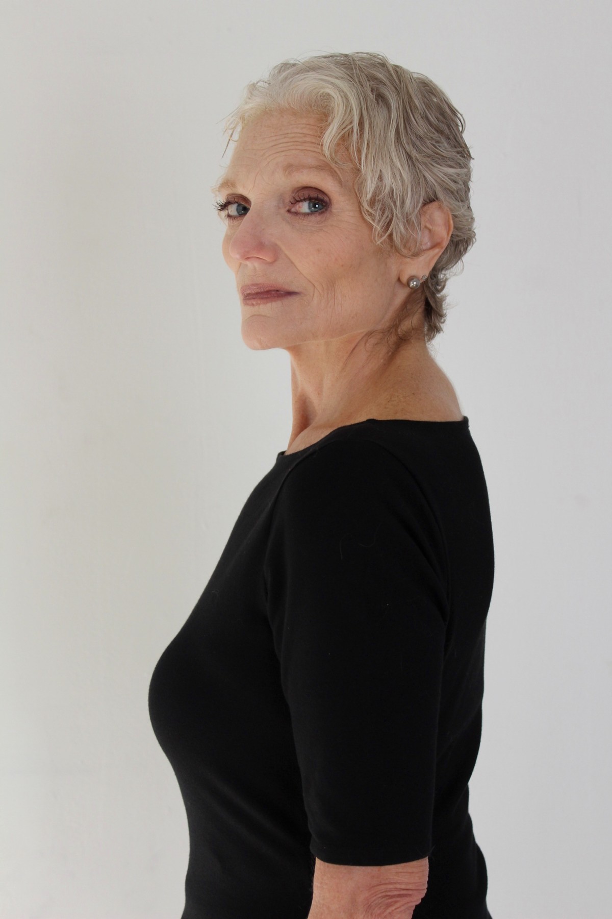 Catherine Handy, three-quarter look back, black top