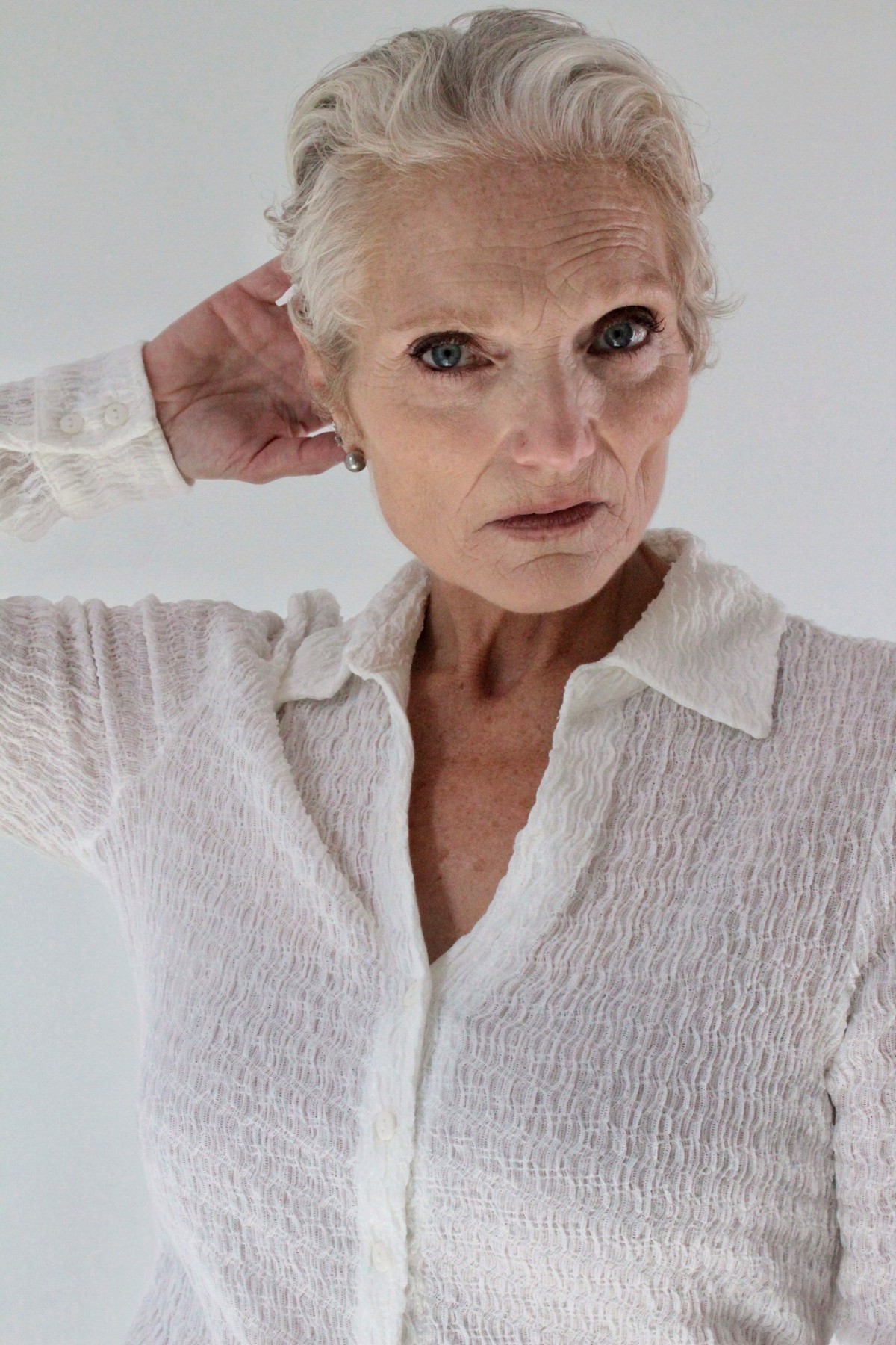 Catherine Handy, editorial close-up in a white shirt, photographer Alexandra Martinez Studio